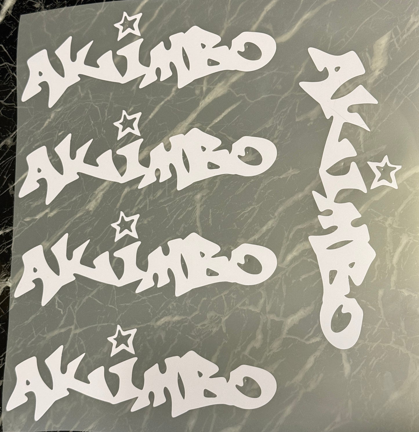 AKIMBO STAR STICKER